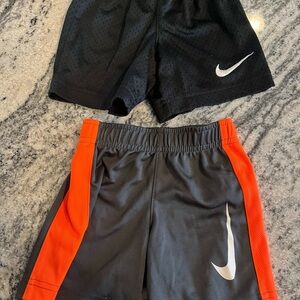 Nike Kids Black and Gray Shorts with White and Orange Details